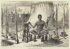 Een Dahomey priester die heilig katoen spint door Sir John Charles Robinson